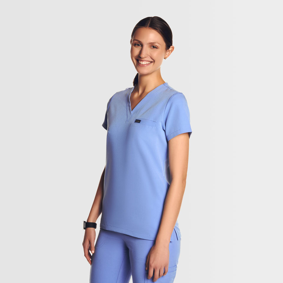 Nura Three Pocket Scrub Top Ceil blue