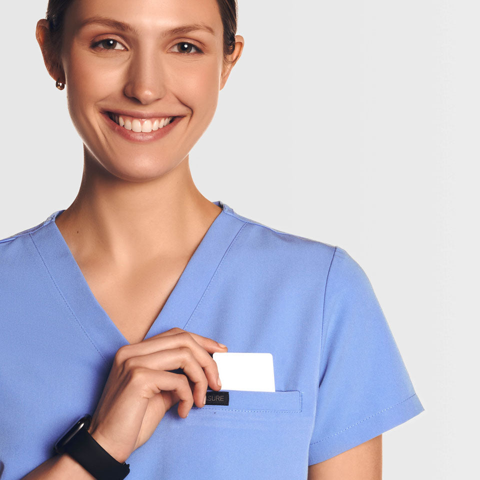 Nura Three Pocket Scrub Top Ceil blue